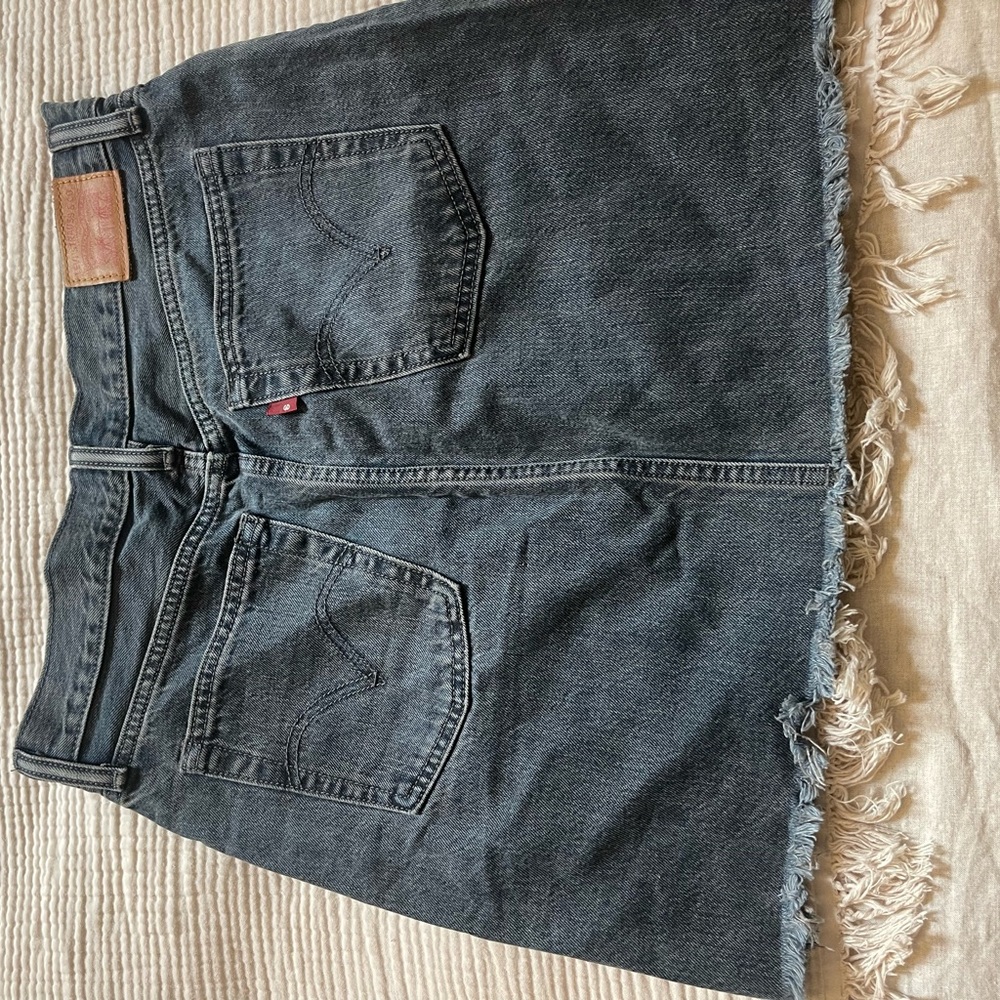 Levi distressed hem mini denim skirt